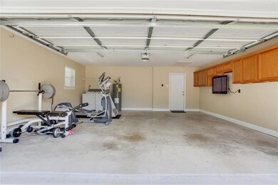 FINISHED 2 CAR GARAGE WITH LAUNDRY HOOK UP AND PLE