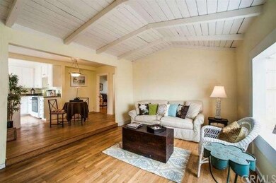 Step up to dining area w/open niche for your china