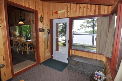 You enter this cabin into a 3-season porch that ca