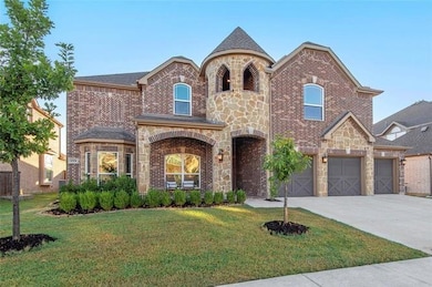 View of front of property with brick siding and a 