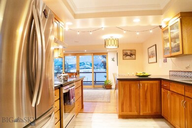 Kitchen with light hardwood / wood-style flooring,