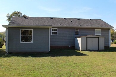 Storage building included.