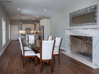 The dining room features a large...