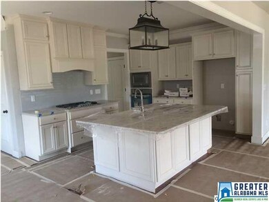 Beautiful kitchen with granite countertops, stainl