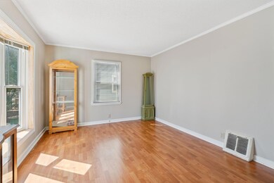 Light-filled living room with bay window