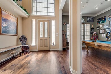 Great entry way with nice hardwood floors and a ex