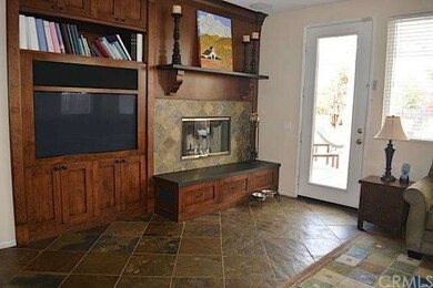 Fireplace with custom cabinets