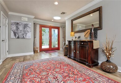 Wide entrance foyer with view of etched glass entr