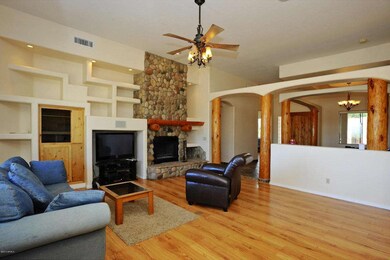 Living room with fireplace, vega poles