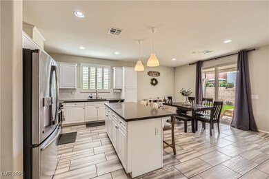 Kitchen featuring tasteful backsplash, stainless s