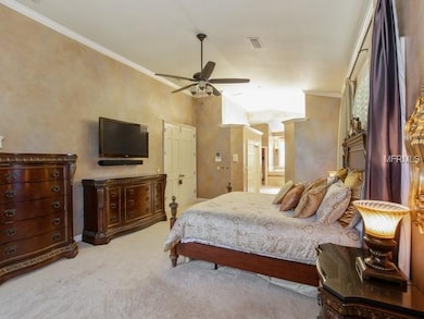 Master bedroom with 2 walk in closets with custom 