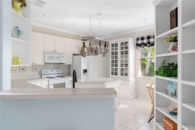 Beautiful kitchen with island and custom built-ins