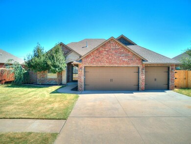 Another view of the front of the house with a 3 ca
