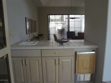 WET BAR BETWEEN LIVING AND DINING AREA