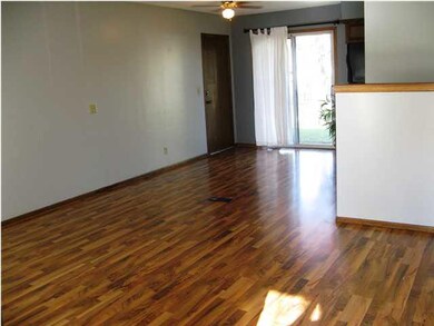 Large main floor living room adjoins dining area.