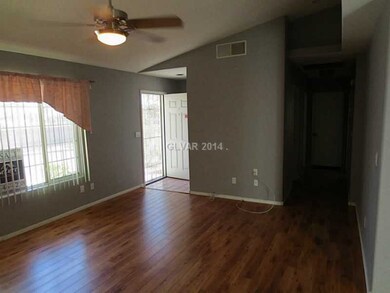 Living Room. front hall closet behind the front do