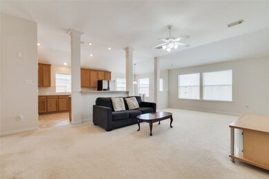 The open family room and kitchen being makes a perfect space for entertaining friends and family.