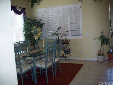 Dining Room. Shutters open to den/office.