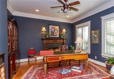 Large beautiful office with fireplace.