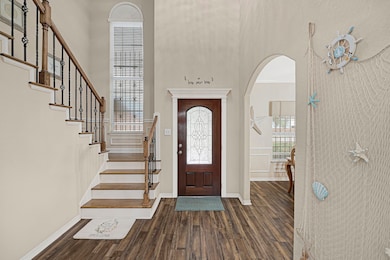 Warm and inviting entryway flows seamlessly into t