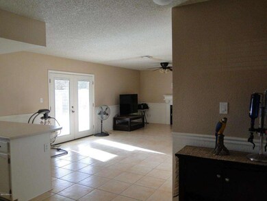 View of family room from eat in kitchen