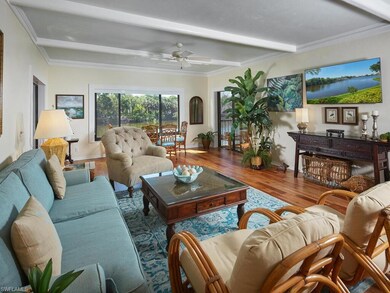 Large living room with adjoining lanai overlooking