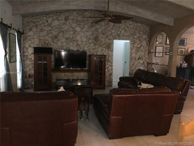 living room is in the center of this split plan, t