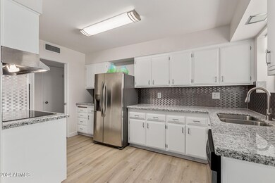 9909 W Sun City Blvd, Sun City, AZ 85351 - photo 5