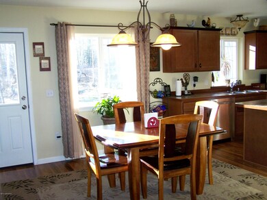 Dining area toward sunny backyard