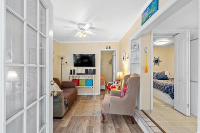 Living room featuring light wood-type flooring, or