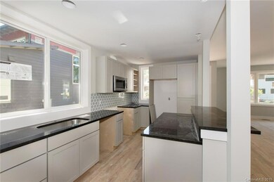 Granite Counters and Tile Backsplash