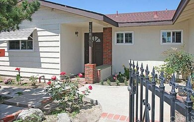 Gated front courtyard entry