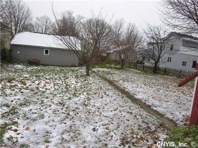 Exterior Back back yard and view of the garage