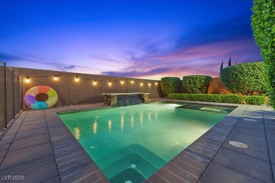 View of pool featuring a fenced backyard and a poo