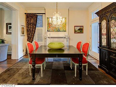 Dining Room - with fireplace and door to the side deck.