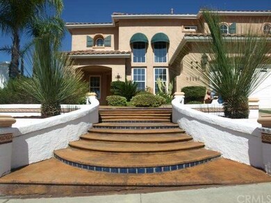 Attractive earth hued steps bordered by Greecian w