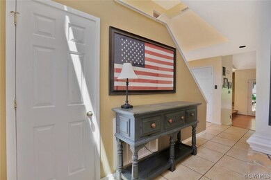 Light filled entry foyer with tile floors.