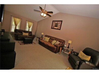 Family room with Vaulted Ceilings.