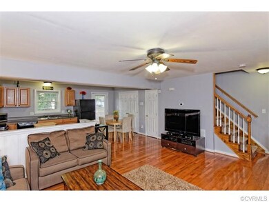 The open floor plan of the downstairs living space