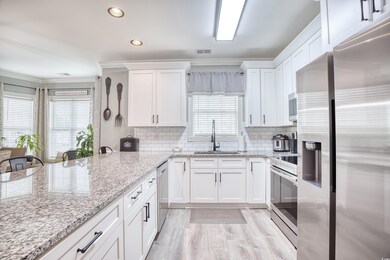 Kitchen with appliances with stainless steel finis