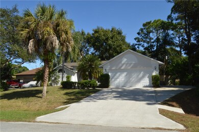 NICE DRIVEWAY WITH EXTRA SIDE PAD FOR YOUR TOYS!