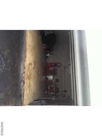 Garage. This shows the interior of the size of gar