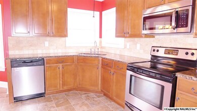 Great updates in your kitchen! Stainless steel appliances, granite counter tops, updated plumbing fixtures, gorgeous cabinets & tile backsplash!