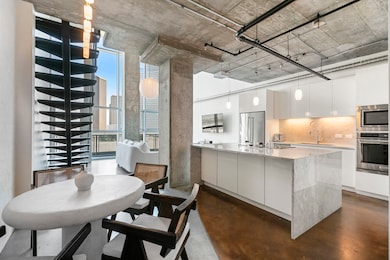 Polished concrete flooring, floor to ceiling windo