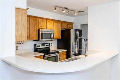 Kitchen with appliances with stainless steel fini