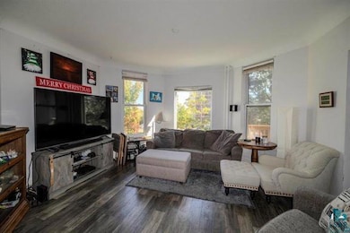 Living area with wood finished floors