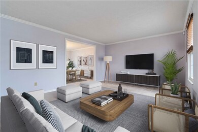Living room right off the entry and connects to th