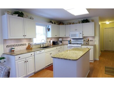 Plenty of cabinets and large center island.