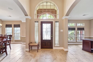 Front entrance has an abundance of charming windows!