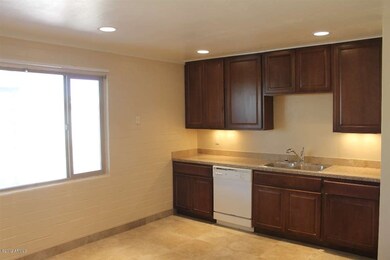 Open kitchen with new cabinets/counters